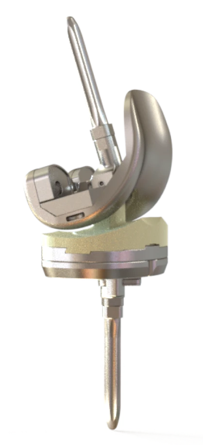Knee implant with a stemmed tibial component for revision knee technology